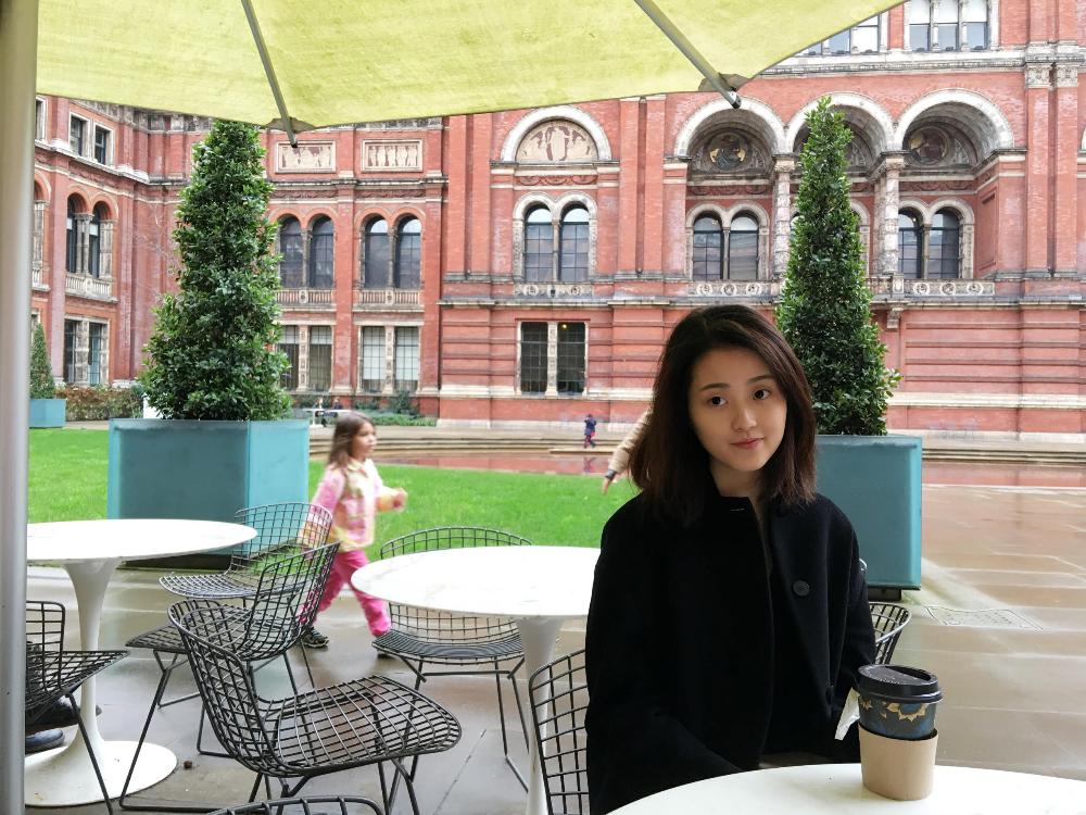 Wheaton student at cafe on LSE campus