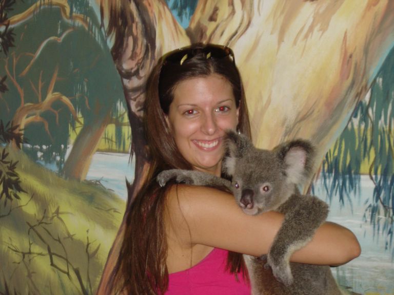 wheaton student holding a koala